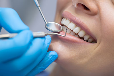 Mann Dental Care | Oral Exams, Temporary Braces and Implant Dentistry