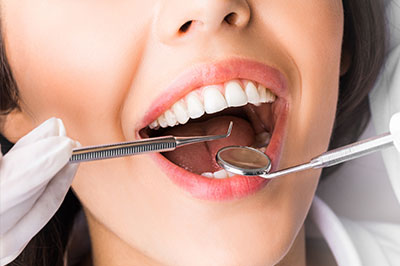 Mann Dental Care | Extractions, ZOOM  Whitening and Root Canals